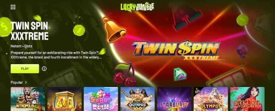 Kuvankaappaus Lucky Jungle Casinon peliaulasta, esillä Twin Spin Extreme pelin banneri ja 7 peliautomaatin kuvakkeet