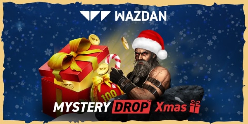 Wasdan Mystery Drop Xmas, kuvassa rock-henkinen joulupukki lahjalaatikon kanssa