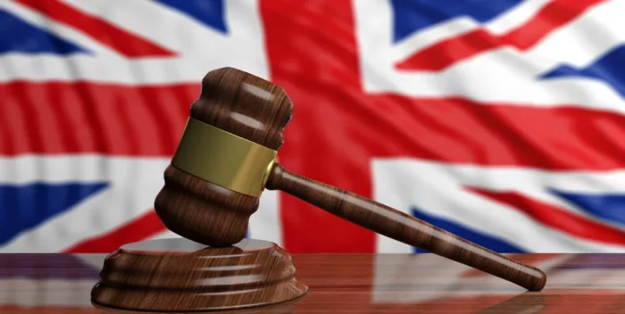 Is Regulation Killing the UK Online Casino Scene? Gavel on UK flag background