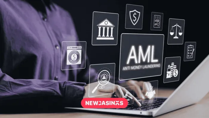 AML Anti Money Laundering and Compliance. Computer with floating symbols denoting AML and more