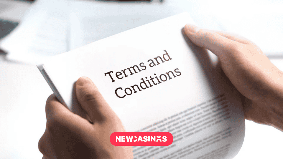 Hands holding a document with 'Terms and conditions' text in legal agreement or document about service policy.