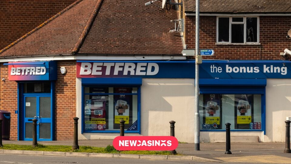 The exterior of a BetFred shopfront. The New Casinos logo in foreground.